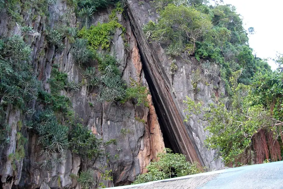 The split, leaning rock face on Khao Phing Kan