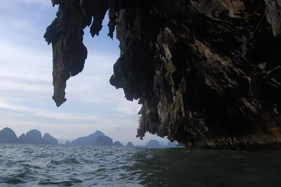 Islands of the bay seen from under a cave overhang on Ko Phanak
