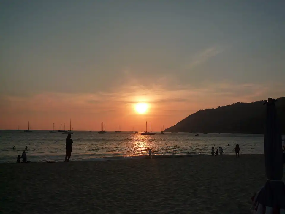 Sunset at Nai Harn with yachts on the anchorage
