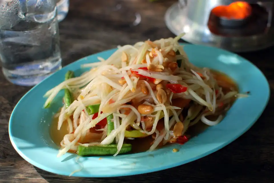 A plate of som tam, the shredded green papaya salad