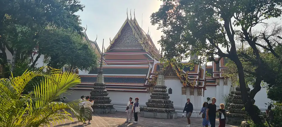 The tiled royal chedis in the grounds of Wat Pho