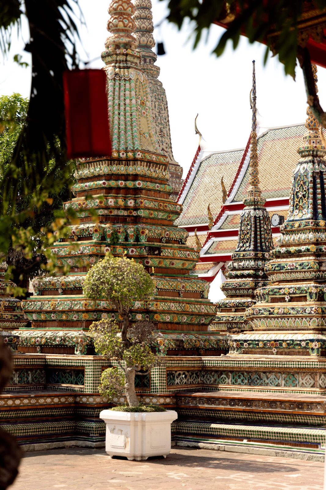 The tiled royal chedis in the grounds of Wat Pho